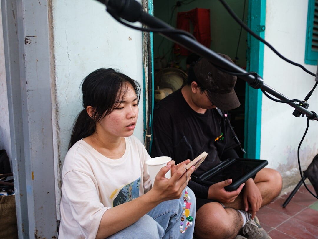 Journalist interviewing a person with microphone